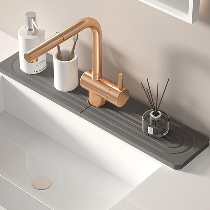 Diatomite kitchen sink splash guard behind faucet by Unknown