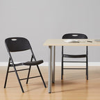 Amazon Basics Portable Folding Plastic Chair, Events Seating, Easy to Store, 350-Pound Capacity, Black, 2-Pack - Image 2