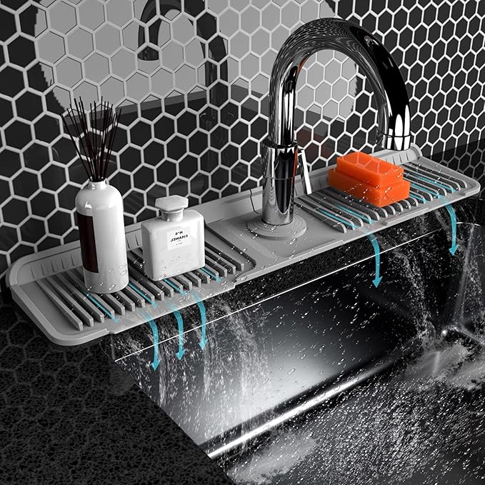 Folding sink splash guard behind faucet-faucet mat by Unknown